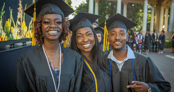Three graduates